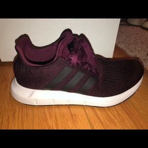 Maroon adidas sneakers